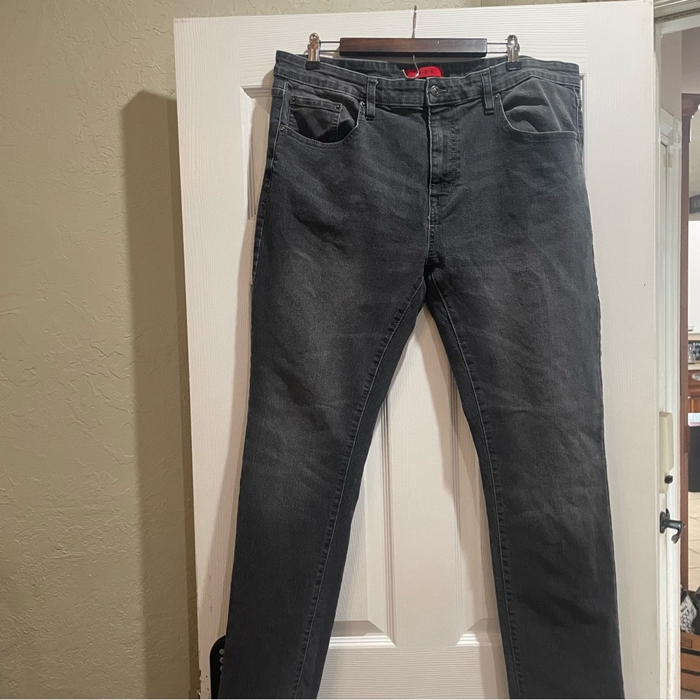 Soft, stretchy denim. Distressed black